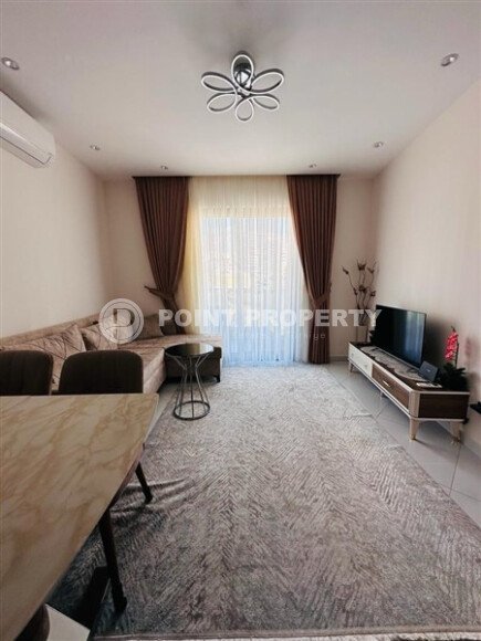 Уютная квартира 55 м² в жилом комплексе с инфраструктурой, район Махмутлар-id-10563-фото-8