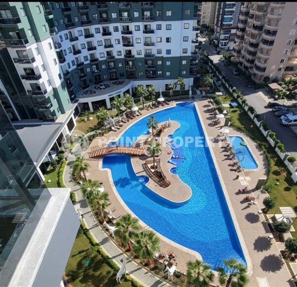 Уютная квартира 55 м² в жилом комплексе с инфраструктурой, район Махмутлар-id-10563-фото-13