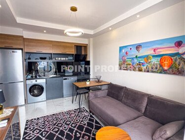 Stylish 50 m² apartment with transfer to the sea, Mahmutlar district-id-10567-photo-1