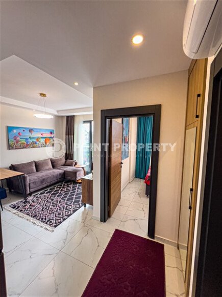 Stylish 50 m² apartment with transfer to the sea, Mahmutlar district-id-10567-photo-2
