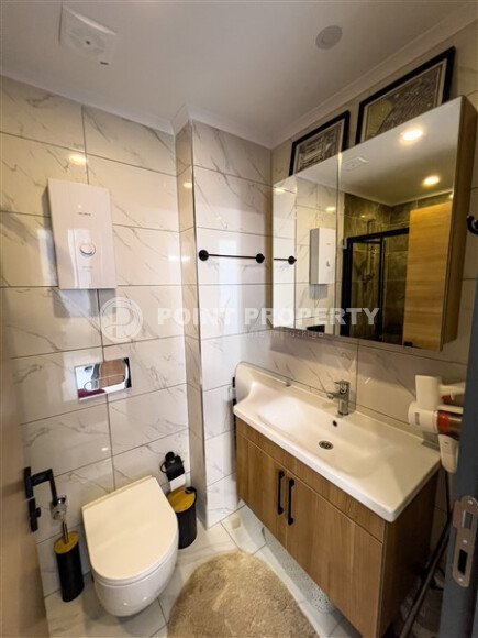 Stylish 50 m² apartment with transfer to the sea, Mahmutlar district-id-10567-photo-9