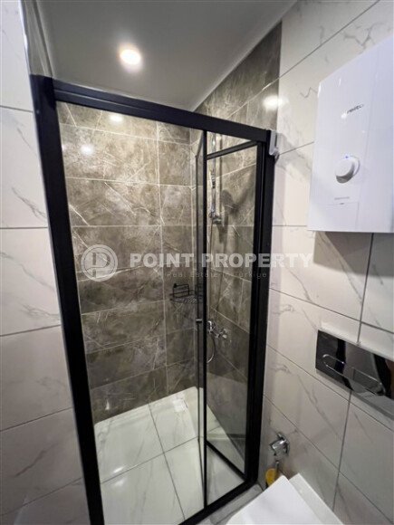 Stylish 50 m² apartment with transfer to the sea, Mahmutlar district-id-10567-photo-10