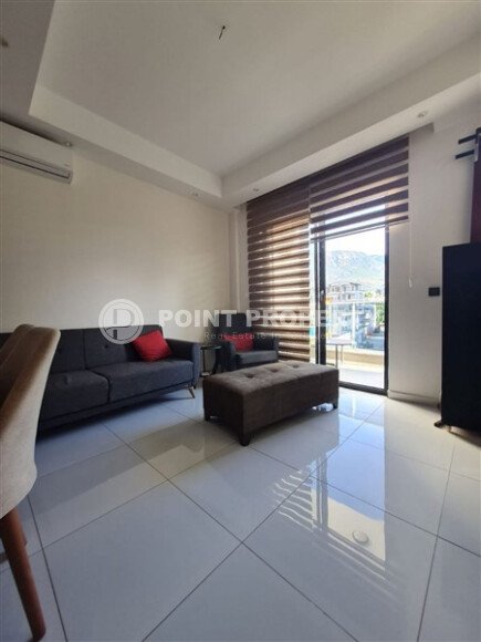 Comfortable apartment 55 m² with mountain views, Mahmutlar district-id-10569-photo-2