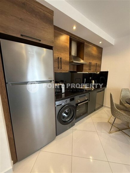 Comfortable apartment 55 m² with mountain views, Mahmutlar district-id-10572-photo-2