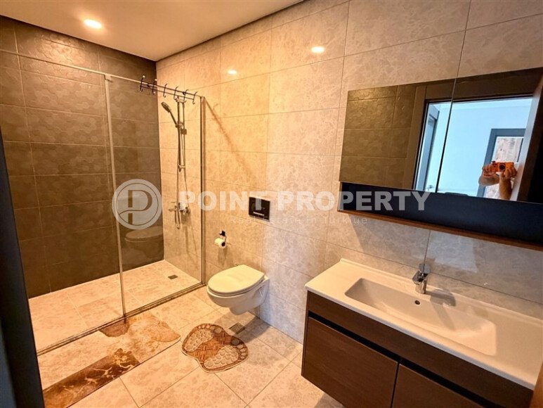 Stylish duplex 95 m² with sea and mountain views, Mahmutlar district-id-10573-photo-11