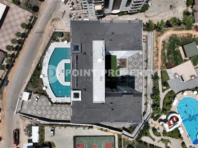 Современная квартира 1+1 в районе Авсаллар в комплексе с богатой инфраструктурой-id-10577-photo-7