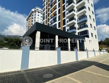 Светлая квартира 50 м² с панорамными окнами и видом на море, район Махмутлар-id-10581-photo-1