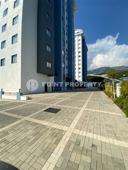 Светлая квартира 50 м² с панорамными окнами и видом на море, район Махмутлар-id-10581-photo-3