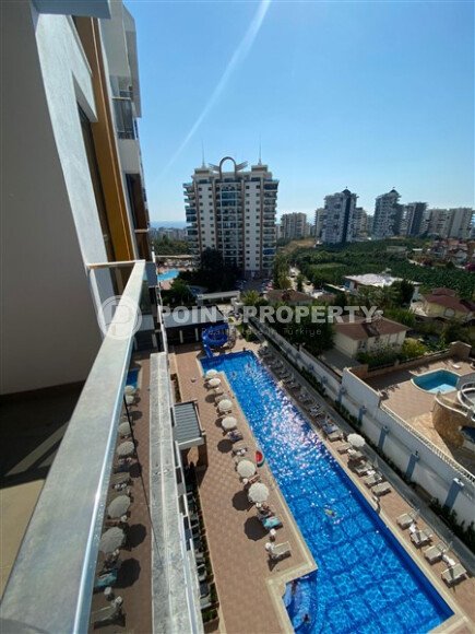 Светлая квартира 50 м² с панорамными окнами и видом на море, район Махмутлар-id-10581-photo-5