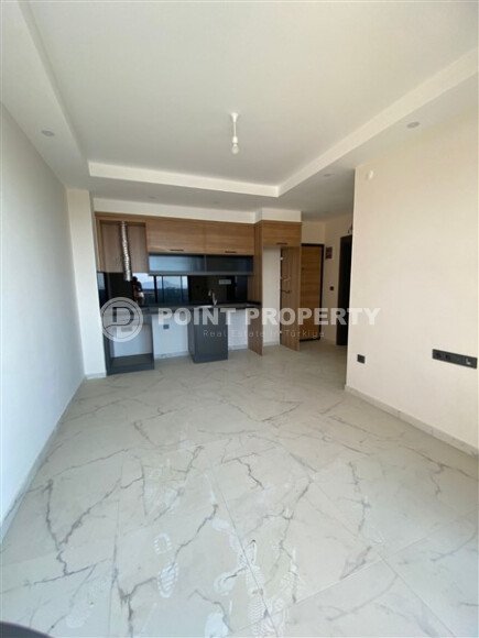 Светлая квартира 50 м² с панорамными окнами и видом на море, район Махмутлар-id-10581-photo-6