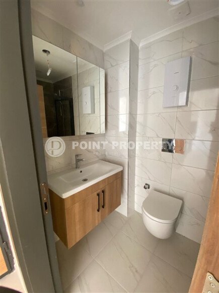 Светлая квартира 50 м² с панорамными окнами и видом на море, район Махмутлар-id-10581-photo-11