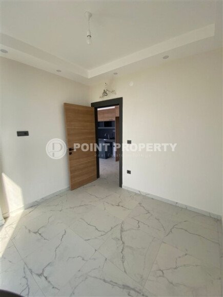 Светлая квартира 50 м² с панорамными окнами и видом на море, район Махмутлар-id-10581-photo-12