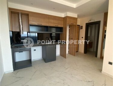 Светлая квартира 50 м² с панорамными окнами и видом на море, район Махмутлар-id-10581-photo-2