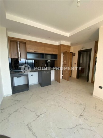 Светлая квартира 50 м² с панорамными окнами и видом на море, район Махмутлар-id-10581-photo-15