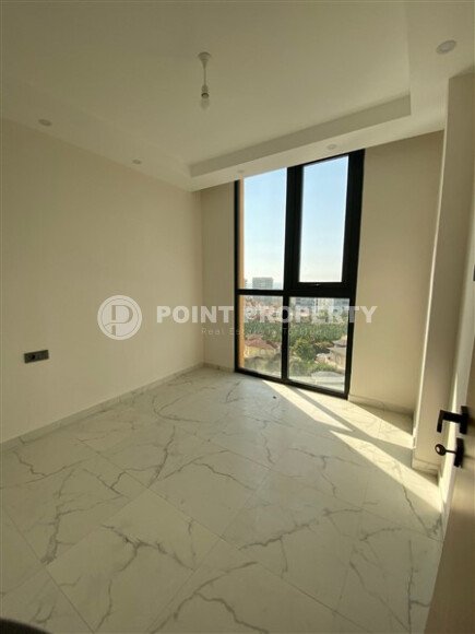 Светлая квартира 50 м² с панорамными окнами и видом на море, район Махмутлар-id-10581-photo-16