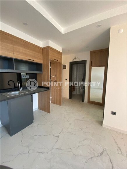 Светлая квартира 50 м² с панорамными окнами и видом на море, район Махмутлар-id-10581-photo-19