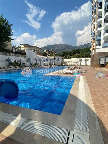 Светлая квартира 50 м² с панорамными окнами и видом на море, район Махмутлар-id-10581-photo-26