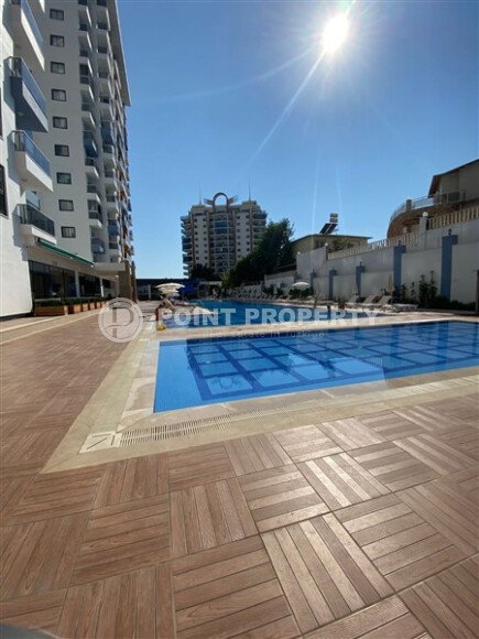 Светлая квартира 50 м² с панорамными окнами и видом на море, район Махмутлар-id-10581-photo-27