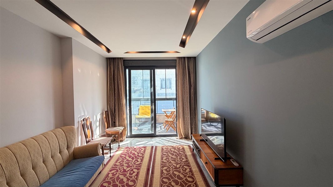 Современная квартира 50 м² с богатой инфраструктурой в центре района Махмутлар-id-10585-фото-5