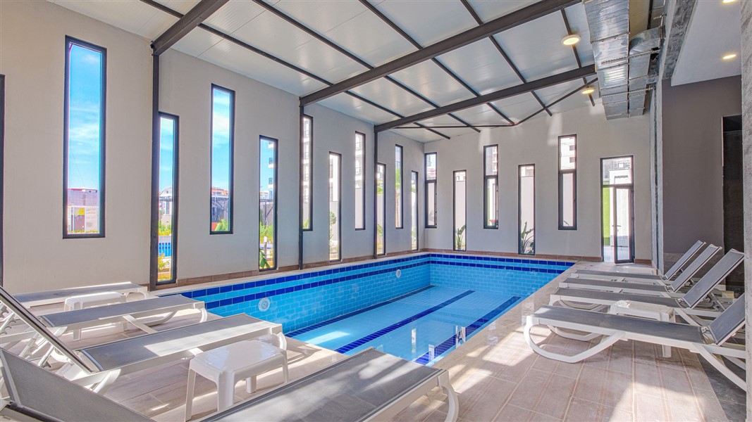 Современная квартира 50 м² с богатой инфраструктурой в центре района Махмутлар-id-10585-фото-14