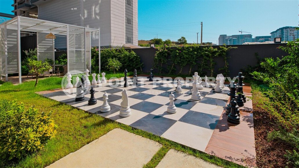 Современная квартира 50 м² с богатой инфраструктурой в центре района Махмутлар-id-10585-фото-20