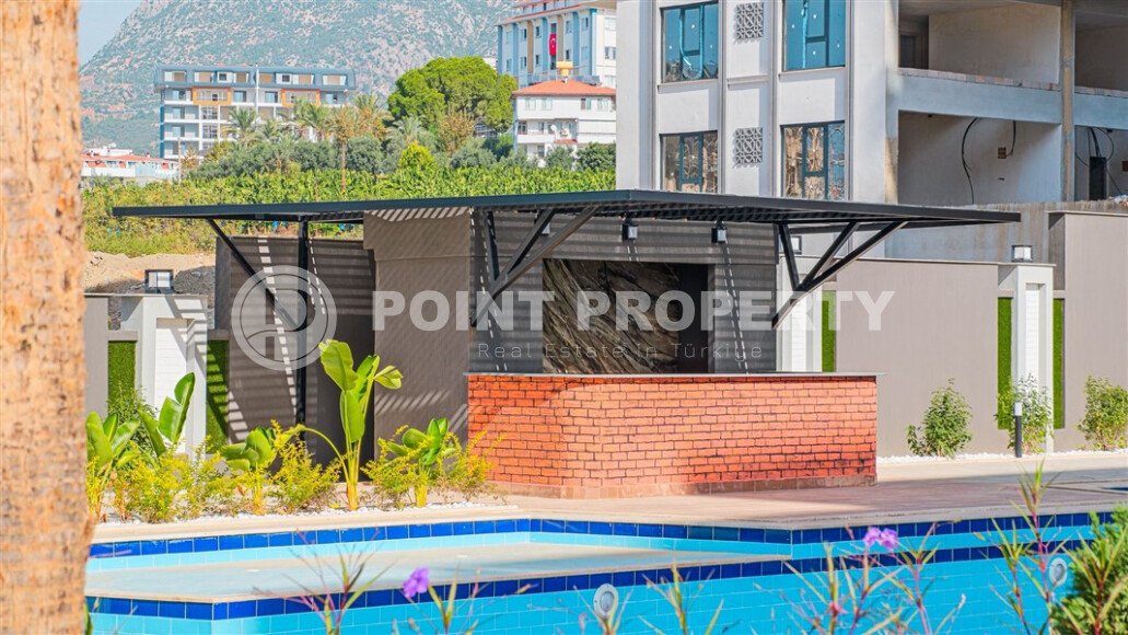 Современная квартира 50 м² с богатой инфраструктурой в центре района Махмутлар-id-10585-фото-22