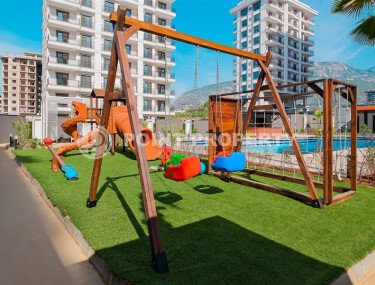 Современная квартира 50 м² с богатой инфраструктурой в центре района Махмутлар-id-10585-photo-1