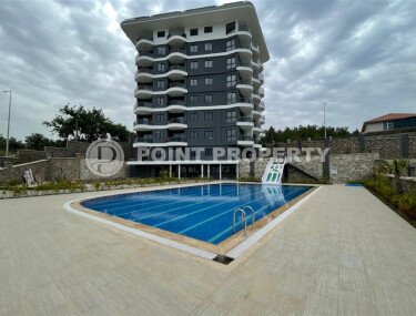 Prestigious 1+1 apartment with mountain views, Demirtaş district-id-10587-photo-1