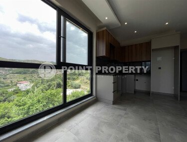 Prestigious 1+1 apartment with mountain views, Demirtaş district-id-10587-photo-4