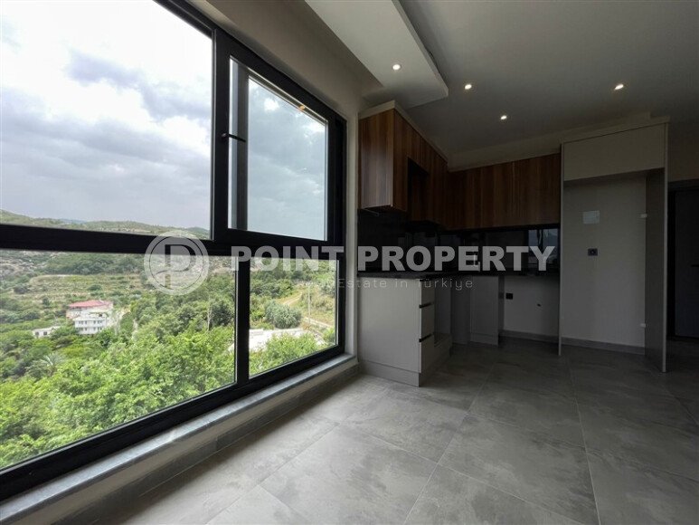 Prestigious 1+1 apartment with mountain views, Demirtaş district-id-10587-photo-4