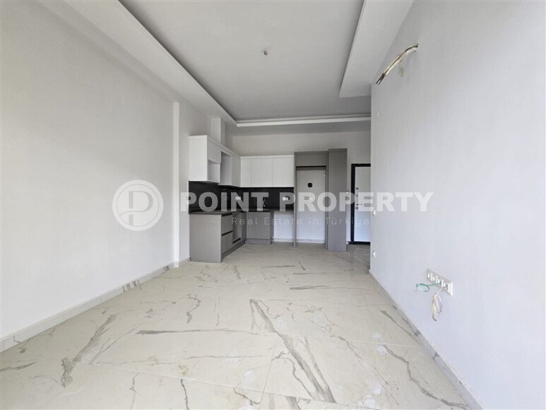 New 1+1 – 50 m² on the main street of Mahmutlar district-id-10589-photo-2