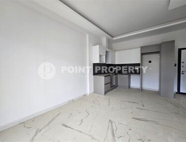 New 1+1 – 50 m² on the main street of Mahmutlar district-id-10589-photo-3