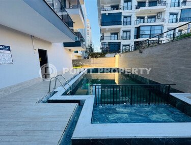 Modern apartment 1+1 – 55 m² a step from the sea in the Mahmutlar area-id-10590-photo-1