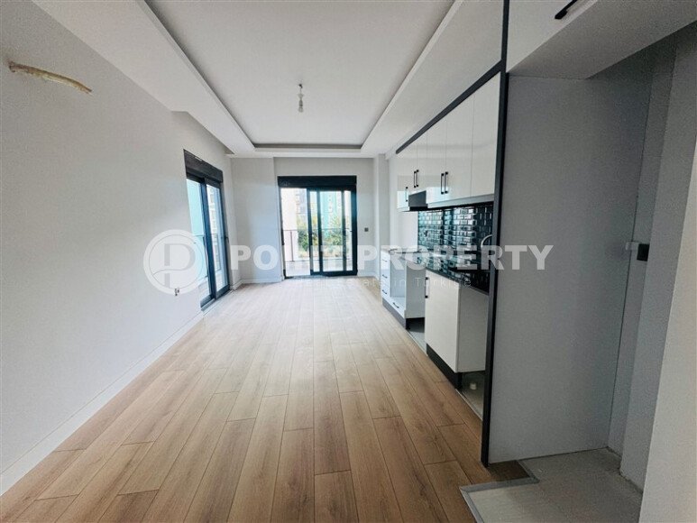 Modern apartment 1+1 – 55 m² a step from the sea in the Mahmutlar area-id-10590-photo-3