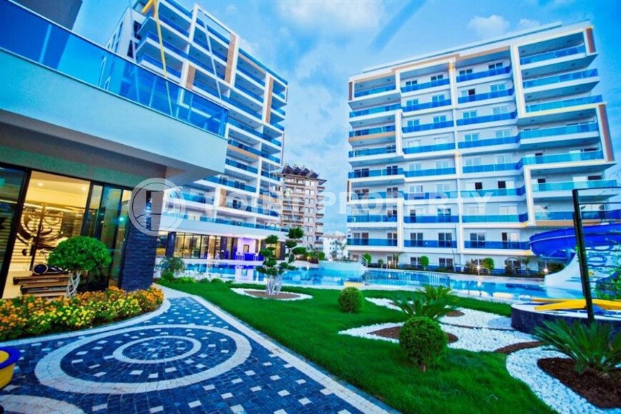 Комфортабельная квартира, 60 м², район Тосмур, с крытой парковкой, частичный вид на море-id-10594-фото-1