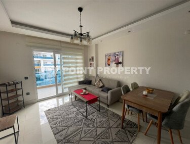 Комфортабельная квартира, 60 м², район Тосмур, с крытой парковкой, частичный вид на море-id-10594-фото-2