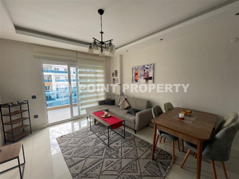 Комфортабельная квартира, 60 м², район Тосмур, с крытой парковкой, частичный вид на море-id-10594-фото-2