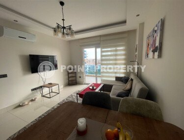 Комфортабельная квартира, 60 м², район Тосмур, с крытой парковкой, частичный вид на море-id-10594-фото-3