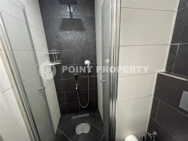 Комфортабельная квартира, 60 м², район Тосмур, с крытой парковкой, частичный вид на море-id-10594-фото-7