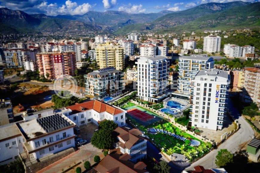 Комфортабельная квартира, 60 м², район Тосмур, с крытой парковкой, частичный вид на море-id-10594-фото-13