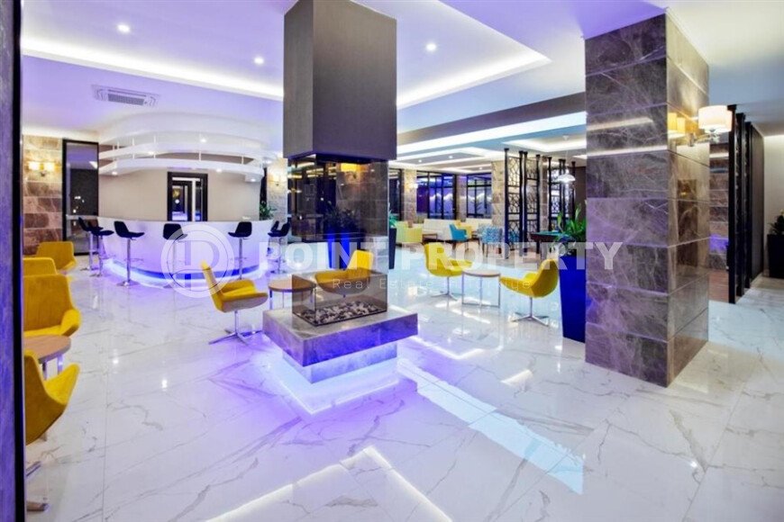 Комфортабельная квартира, 60 м², район Тосмур, с крытой парковкой, частичный вид на море-id-10594-фото-17