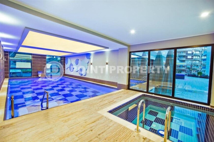 Комфортабельная квартира, 60 м², район Тосмур, с крытой парковкой, частичный вид на море-id-10594-фото-18