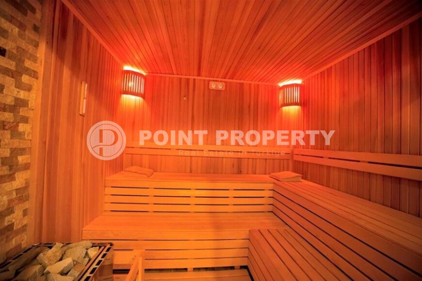 Комфортабельная квартира, 60 м², район Тосмур, с крытой парковкой, частичный вид на море-id-10594-фото-20