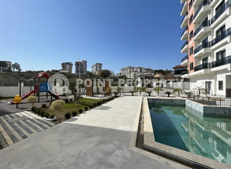 Светлая квартира с трансфером до моря, 55 м², район Авсаллар-id-10607-фото-20