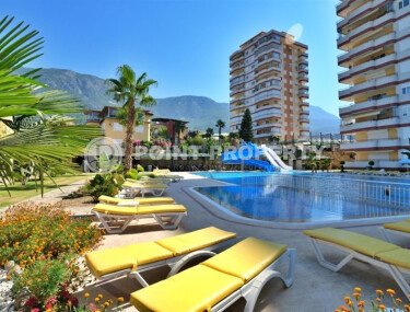 Spacious 130 m² apartment in Mahmutlar, with a separate kitchen and sea view.-id-10610-photo-1