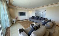Spacious 130 m² apartment in Mahmutlar, with a separate kitchen and sea view.-id-10610-photo-2