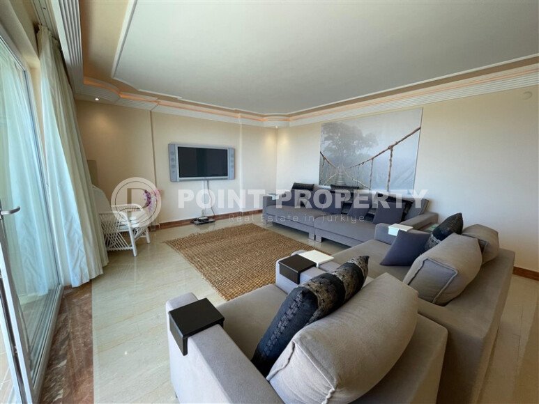 Spacious 130 m² apartment in Mahmutlar, with a separate kitchen and sea view.-id-10610-photo-2