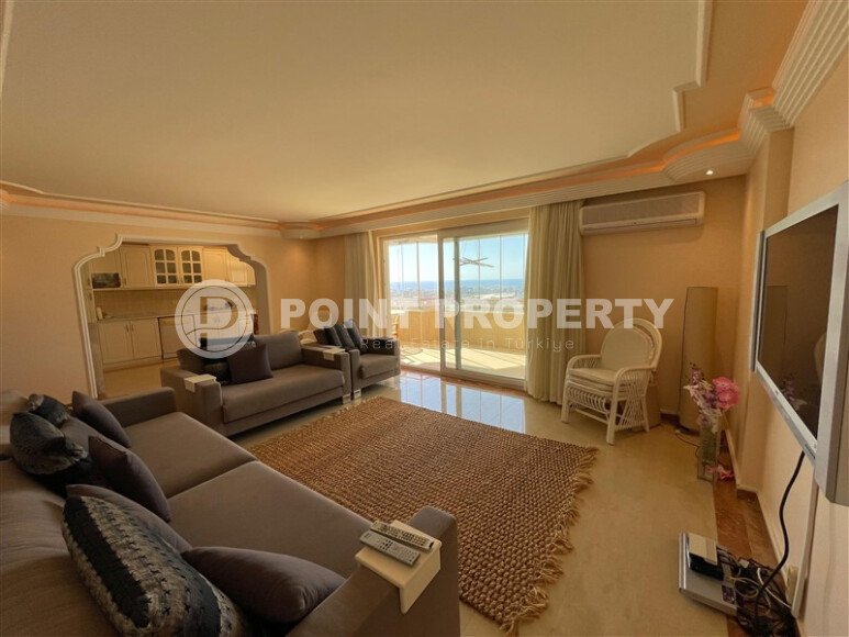 Spacious 130 m² apartment in Mahmutlar, with a separate kitchen and sea view.-id-10610-photo-4