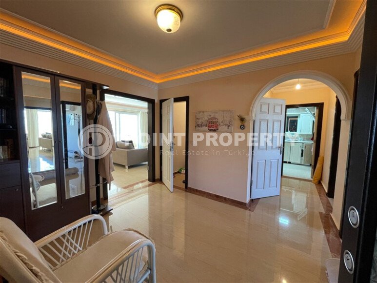 Spacious 130 m² apartment in Mahmutlar, with a separate kitchen and sea view.-id-10610-photo-11