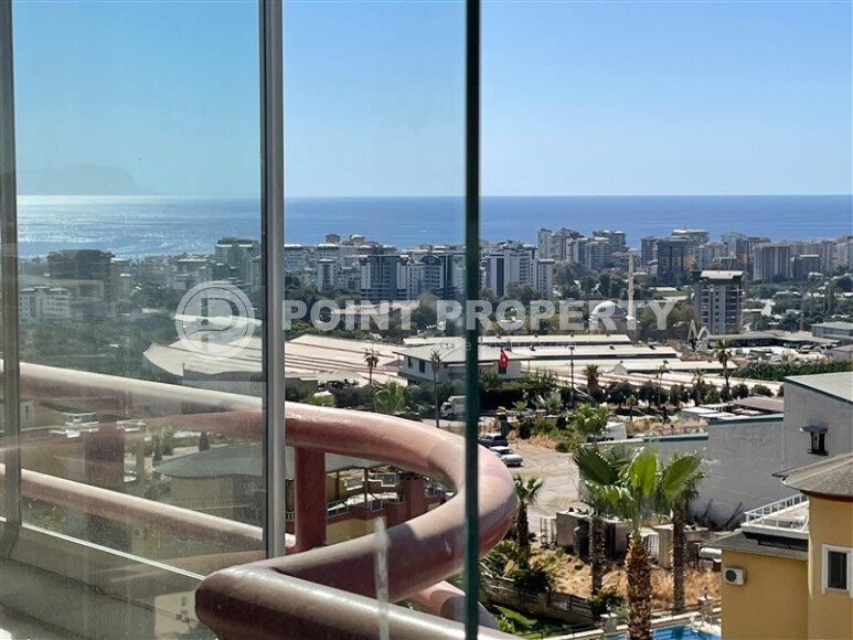 Spacious 130 m² apartment in Mahmutlar, with a separate kitchen and sea view.-id-10610-photo-21